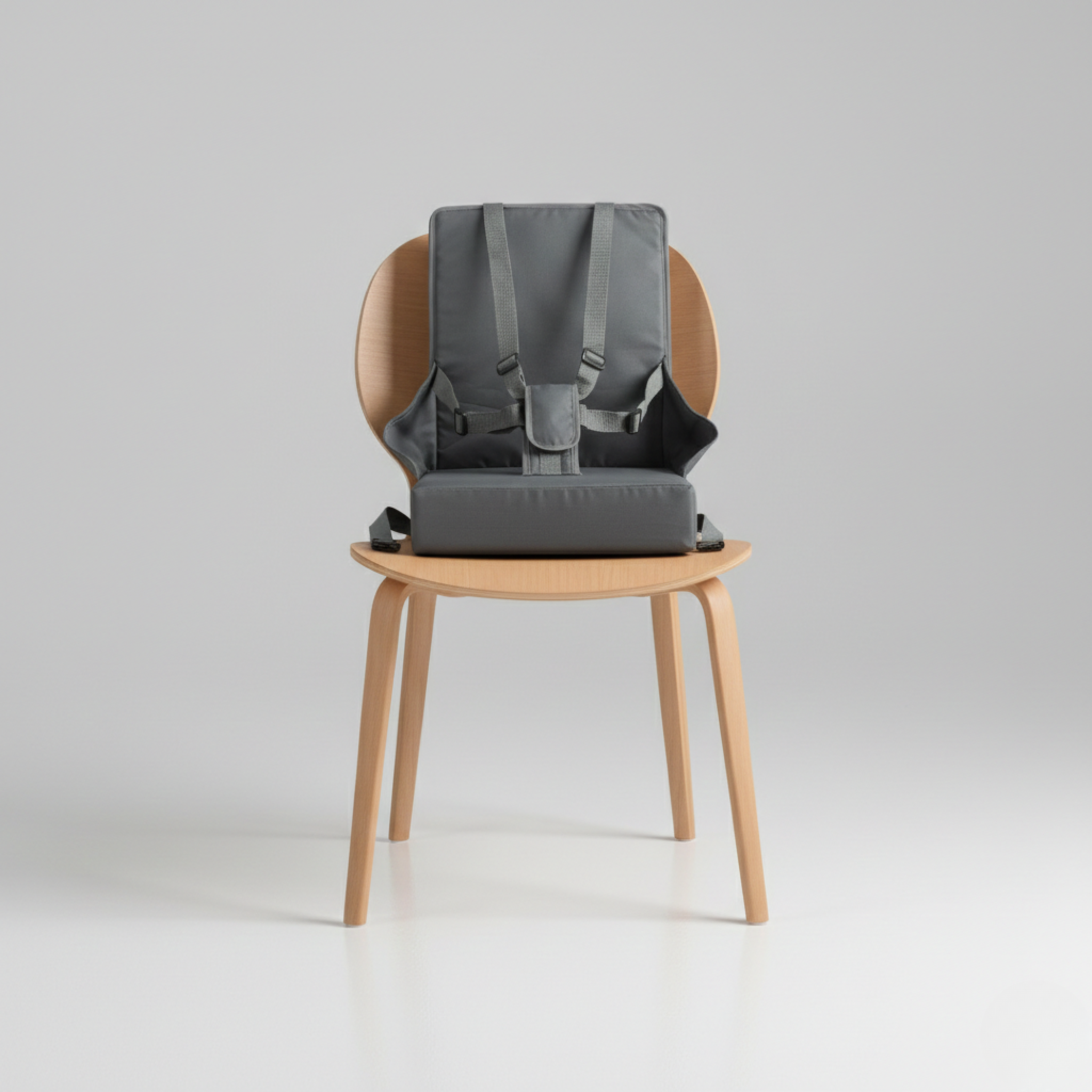 sac rehausseur bébé compact, léger et universel 6 à 36 mois